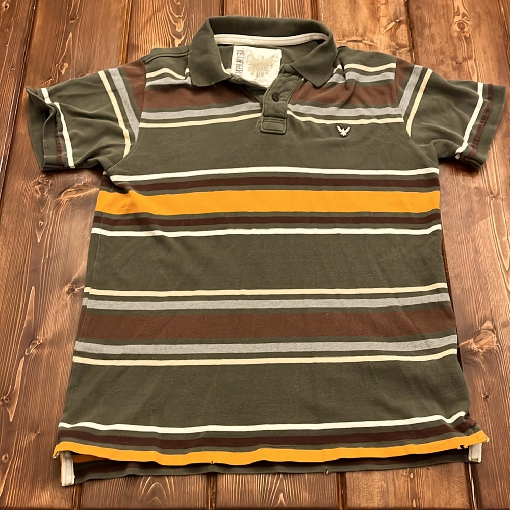 Distressed, green, orange, brown gray company, 81 polo